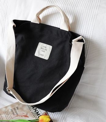 As mulheres luxuosas do zíper coreano da mala a tiracolo da lona ensacam o totalizador simples fêmea da impressão da letra da bolsa de Women Messenger Bag do desenhista